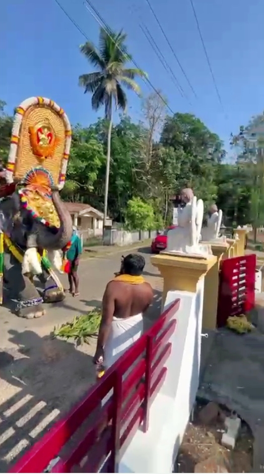 Kneeling in front of the temple during deshpuram