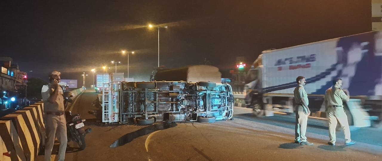 Truck overturns on National Highway